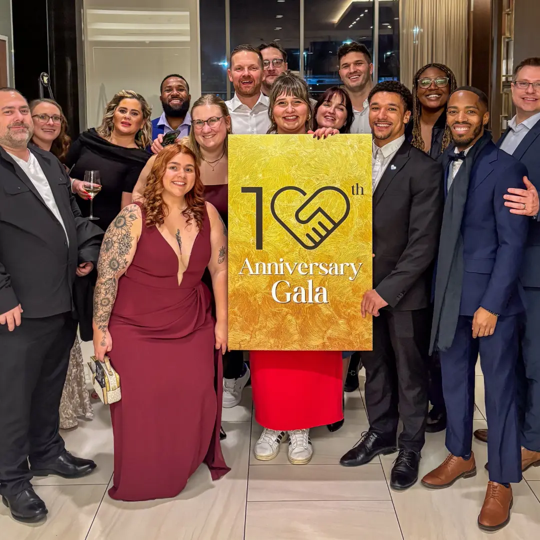 Dedicated Financial GBC team celebrating its 10th anniversary gala featured in company press and media