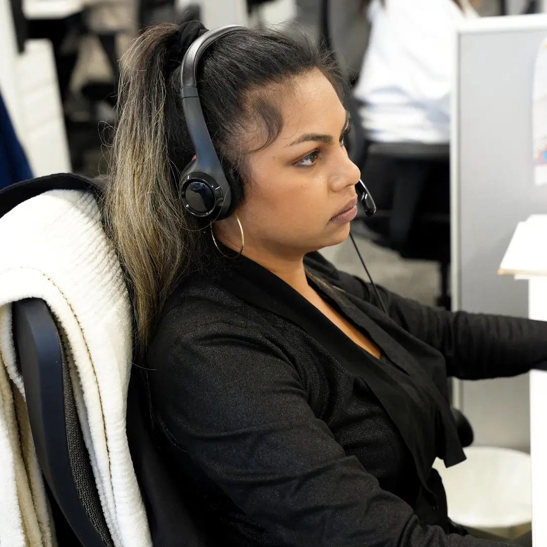 Commercial debt collections team member assisting with outstanding business accounts