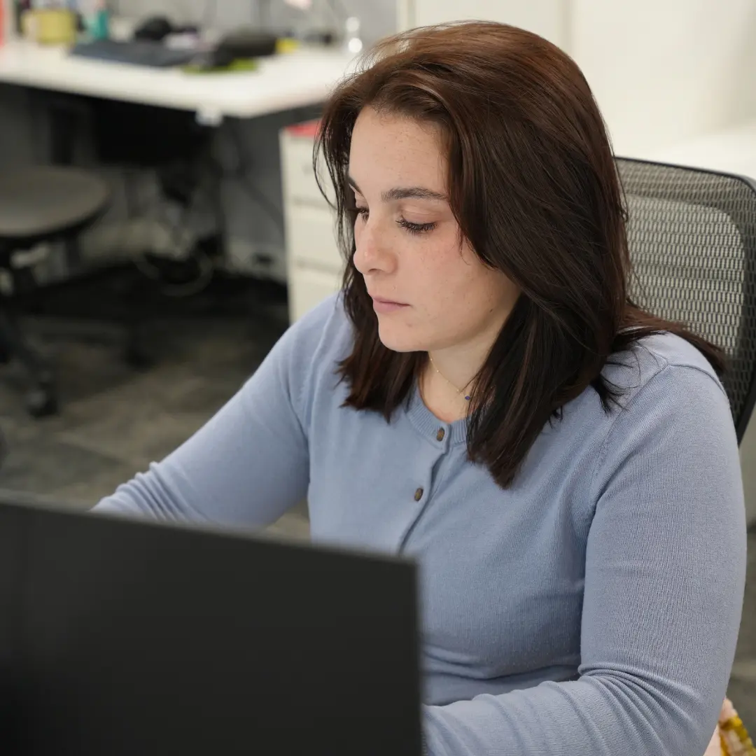 UCC team member working on UCC lien enforcement accounts